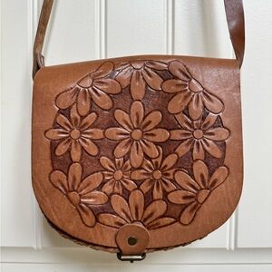 Handmade Leather Floral Embossed Crossbody Mini Saddle Bag. 8” by 7.5” by 3”